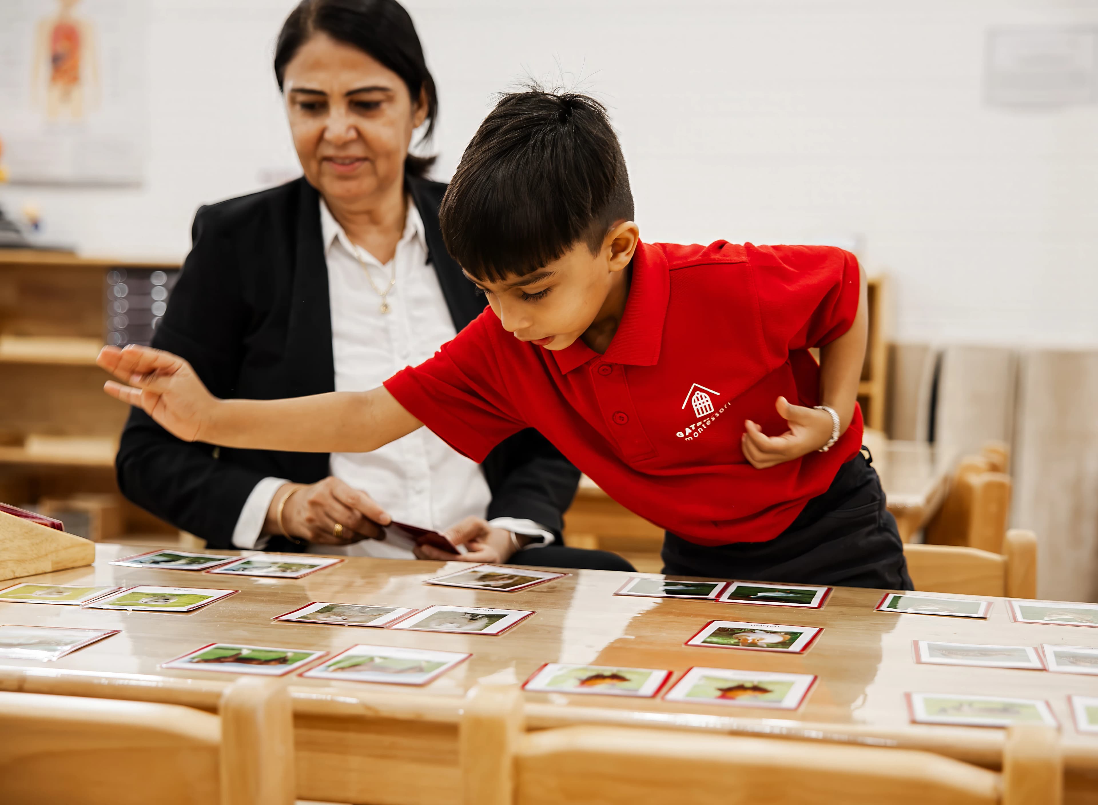 Child working independently with Montessori materials