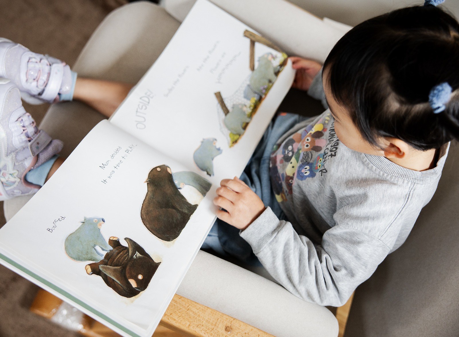 A child reading a picture book