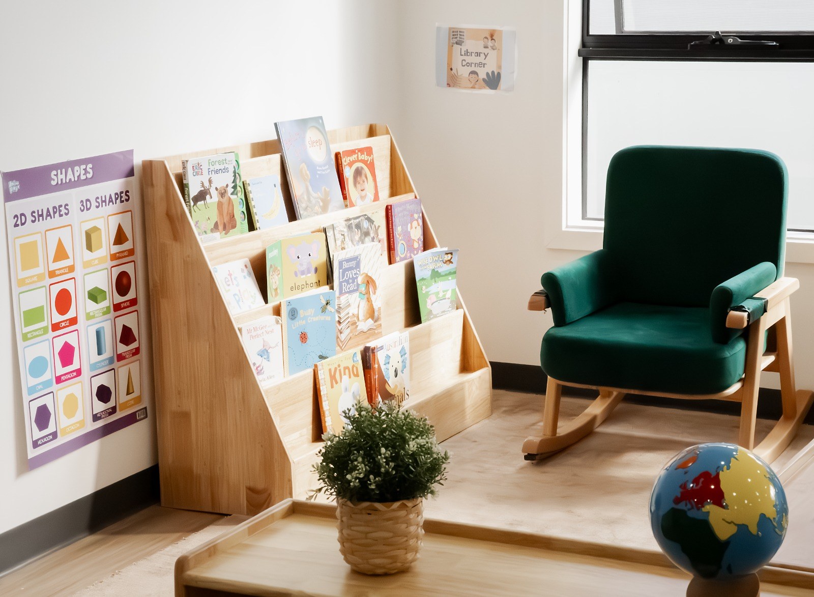 A cosy reading corner with a bookshelf and armchair