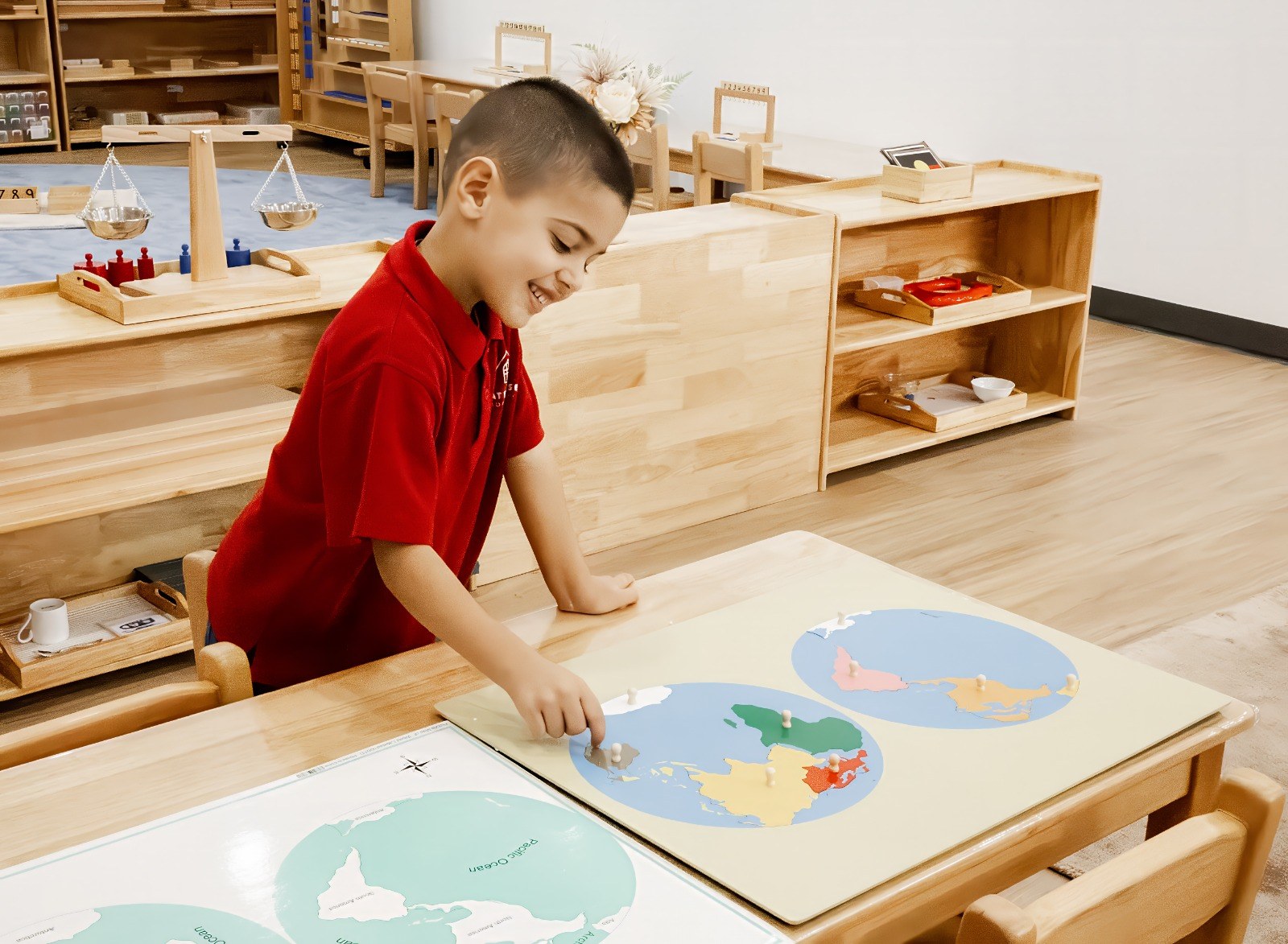 A child working with a world map puzzle