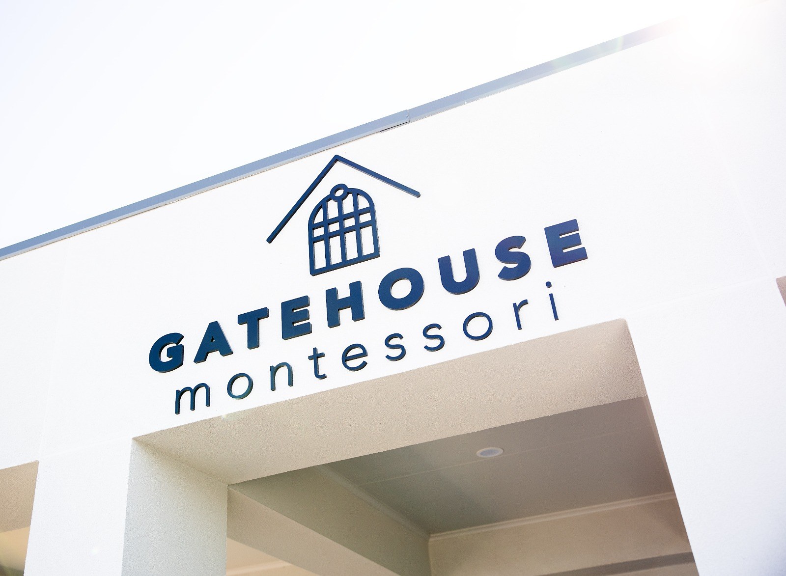 The Gatehouse Montessori sign at the centre entrance