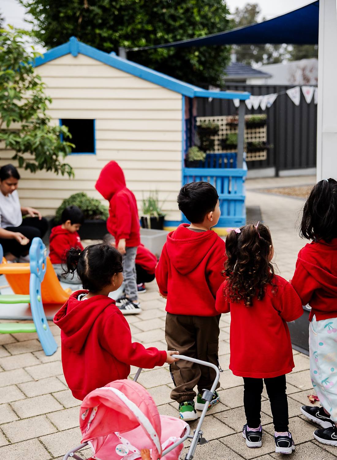 Children exploring the outdoor play area